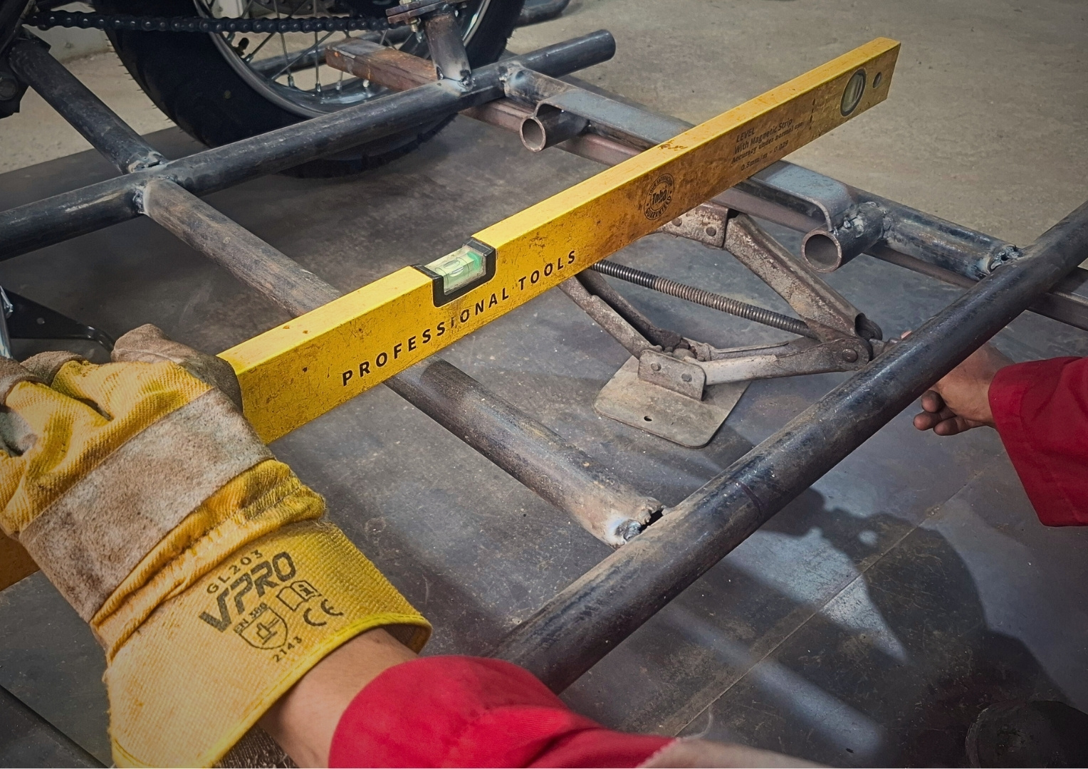 Close-up of the professional welding process on the steel sidecar frame
